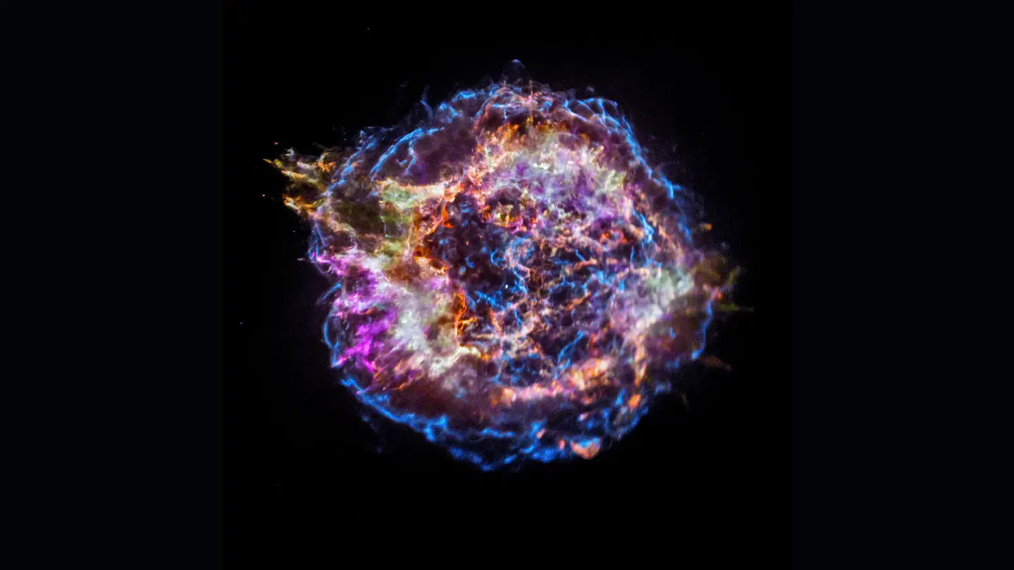 Cassiopeia A supernova remnant: a tangled circular shell coloured to map silicon, sulfur, calcium, iron, and high-energy X-rays.